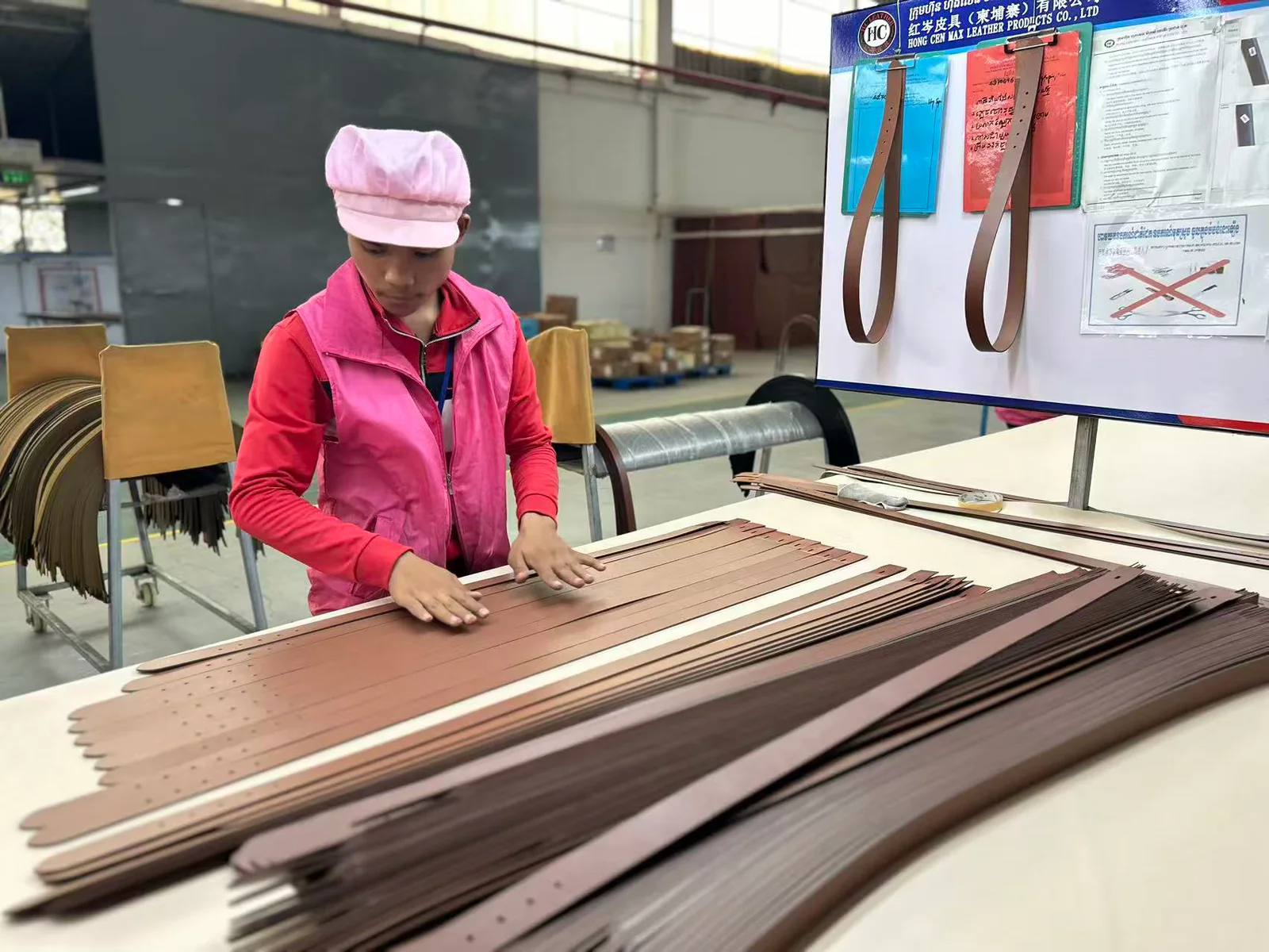 close view of brown belt straps during material preparation