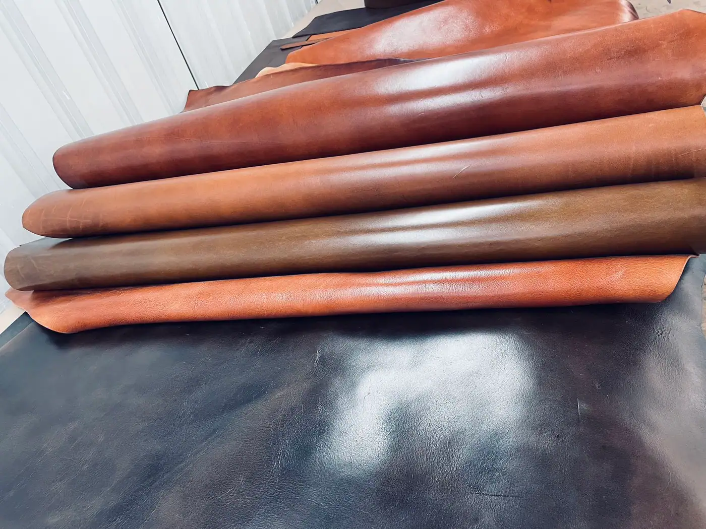 finished leather hides staged in a leather facility