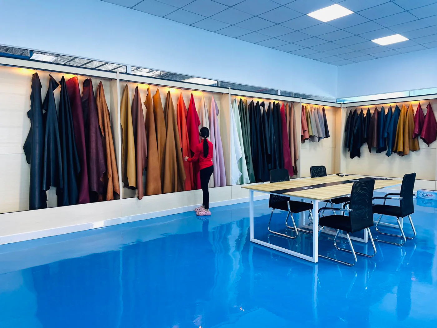 leather quality review taking place in a sample showroom