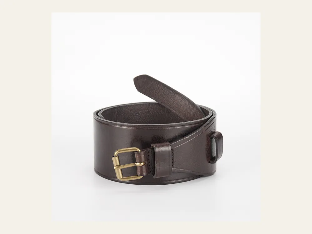 Dark brown wide belt with a stitched keeper and brass buckle on a neutral background