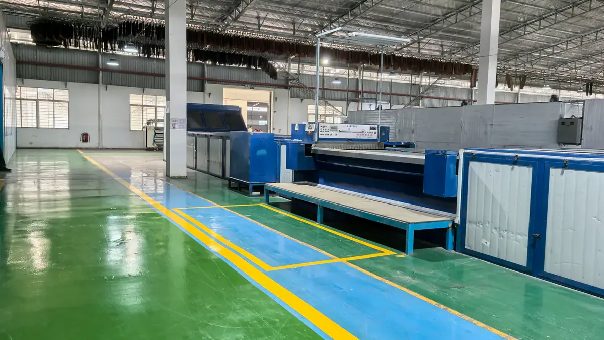 Large leather finishing machine in a production hall