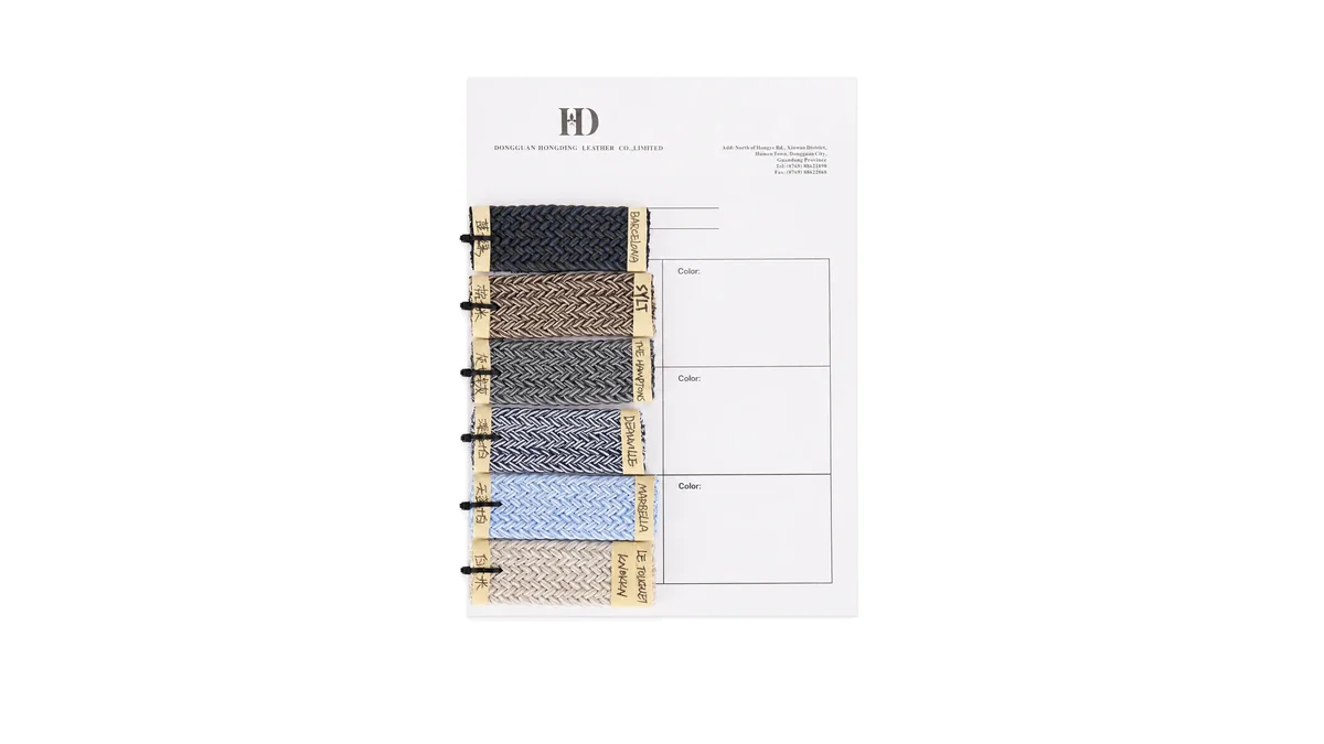 Blue and gray woven belt sample book with multiple strap constructions